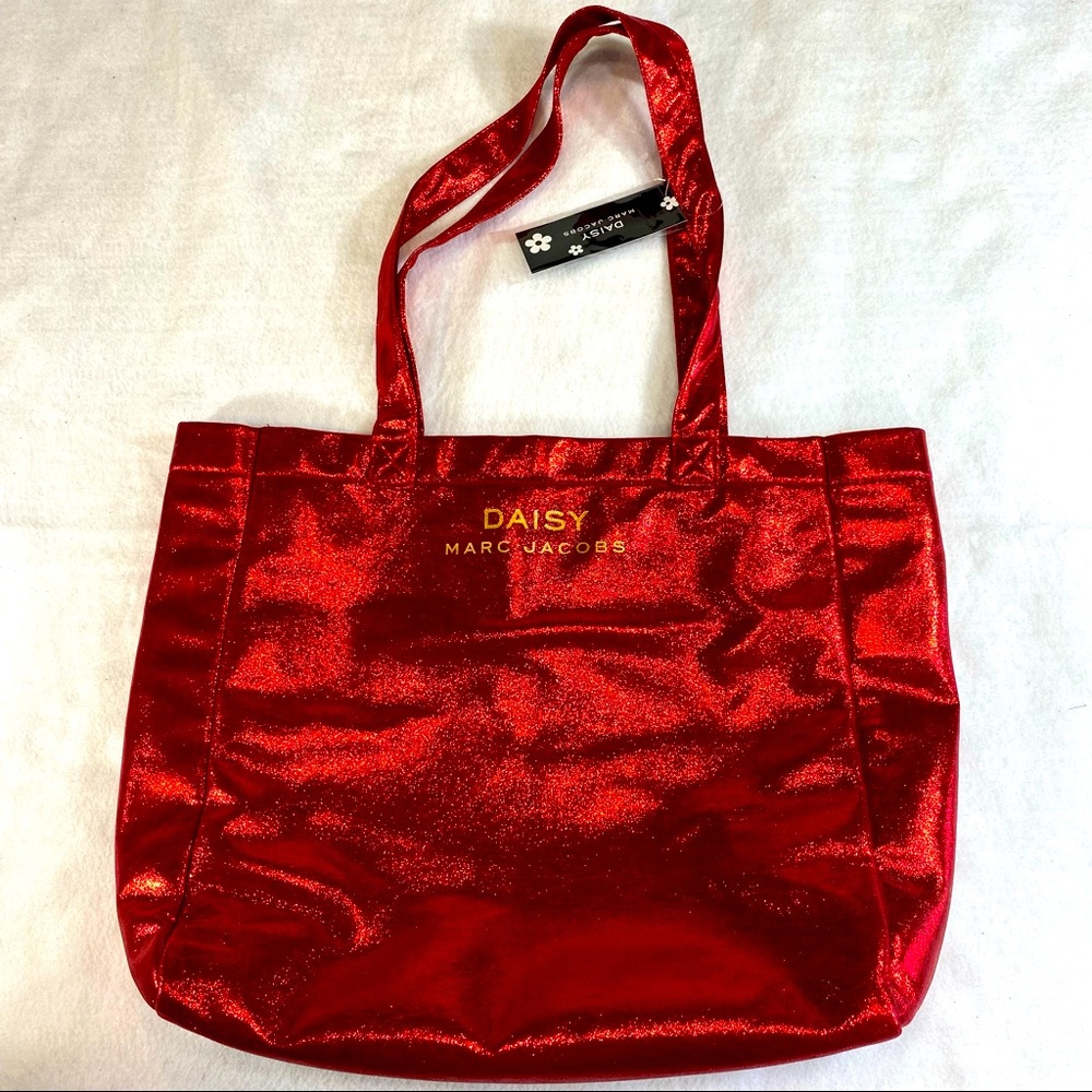 Red sparkly Marc Jacobs gift tote bag.